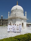 A group photo with Rasul Hudood saheb (dm) near the Rawzah Mubaarakah of Maulaayi Fakhruddin Shaheed saheb (as)